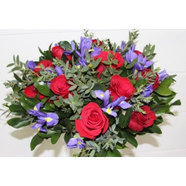 bouquet of red roses, blue irises